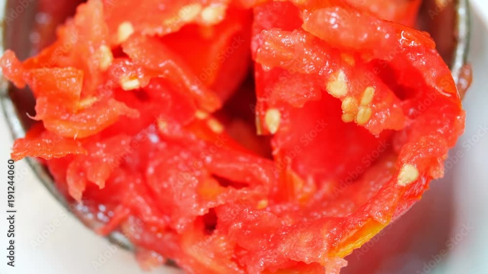 squeezing tomatoes- Making homemade Tomato's sauce in South Italy squeezing tomatoes- Making homemade Tomato's sauce in South Italy