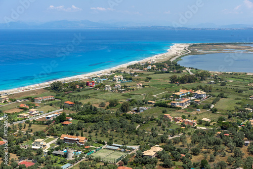 Panoramic view of Agios Ioanis beach with blue waters, Lefkada, Ionian Islands, Greece