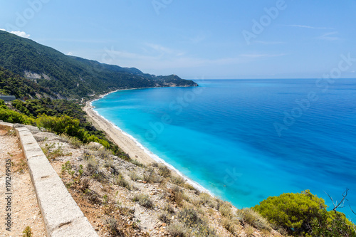 Fototapeta Naklejka Na Ścianę i Meble -  Panoramic view of Kokkinos Vrachos Beach with blue waters, Lefkada, Ionian Islands, Greece