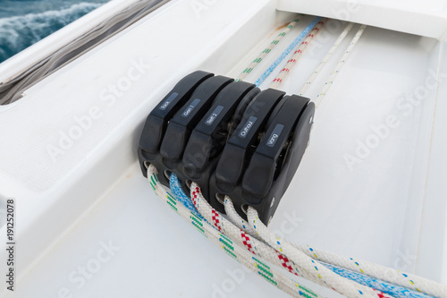 Fotografie Close-up of sailboat rope clutches and rigging lines