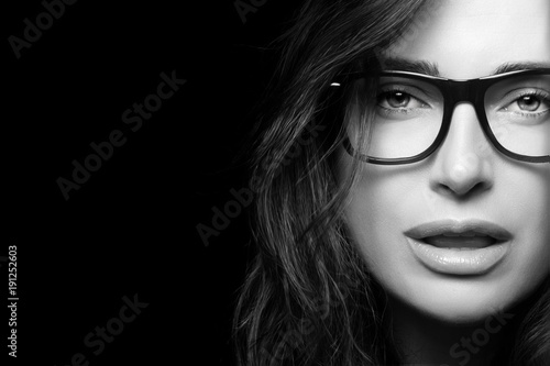 Cool Trendy Eyewear. Beautiful Young Woman in Glasses.