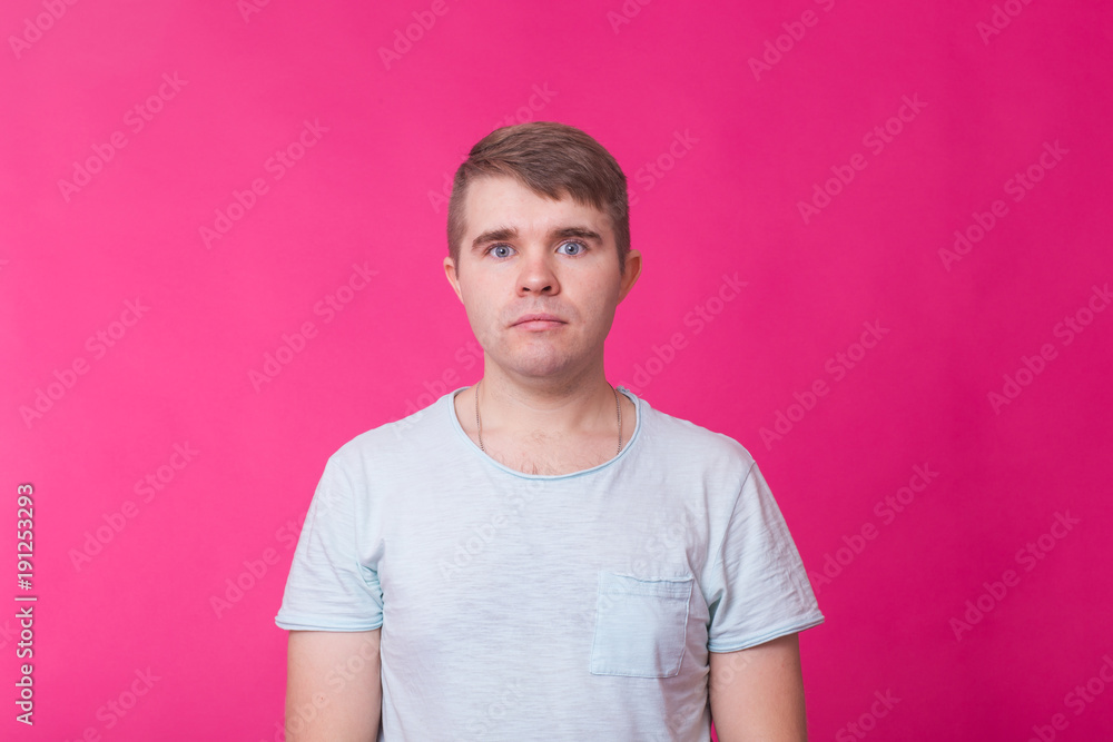 Portrait of shocked caucasian man, looks bugged eyes, being amazed to see something unexpected. Emotions concept Portrait of shocked caucasian man, looks bugged eyes, being amazed to see something unexpected. Emotions concept