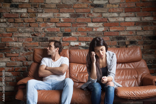 Bild auf Leinwand Frustrated upset couple in quarrel not talking after fight, offended stubborn in