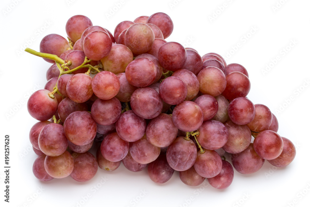 Ripe red grape isolated on white.