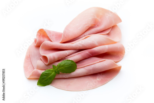 Sliced boiled ham sausage isolated on white background, top view.