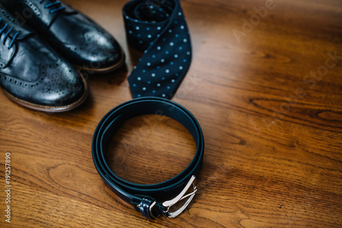 Male accessories. Shoes with tie and cuff