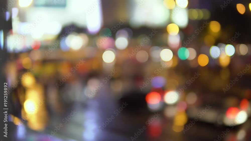 evening in the big city, the light from the lanterns in the courtyard of the house in which the parked cars evening in the big city, the light from the lanterns in the courtyard of the house in which the parked cars