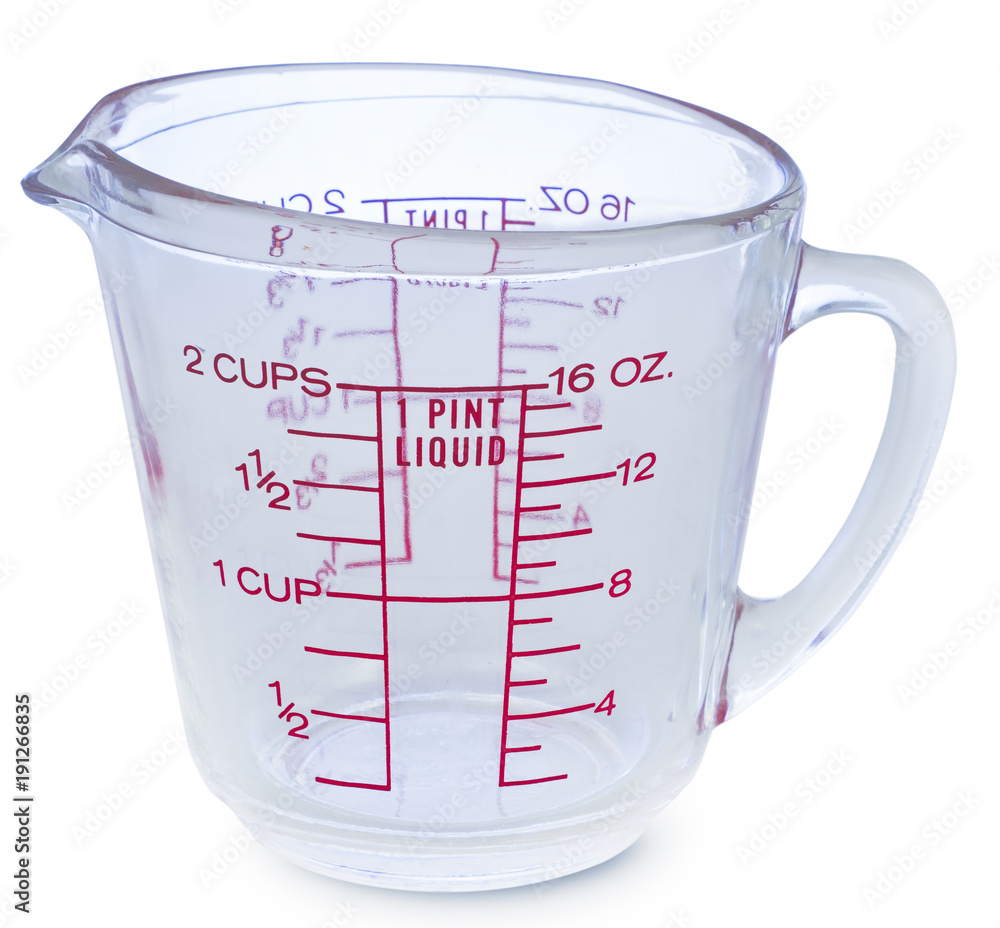 Empty measuring glass cup 1 Pint liquid on white background Empty measuring glass cup 1 Pint liquid on white background