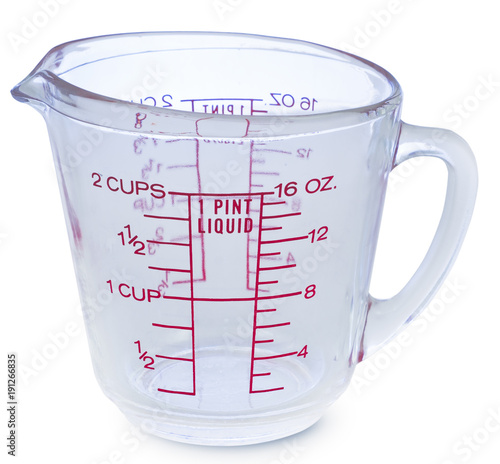 Empty measuring glass cup 1 Pint liquid on white background