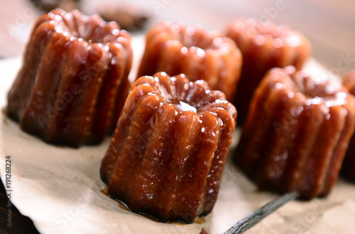 Caneles de bordeaux - traditional French sweet dessert photo