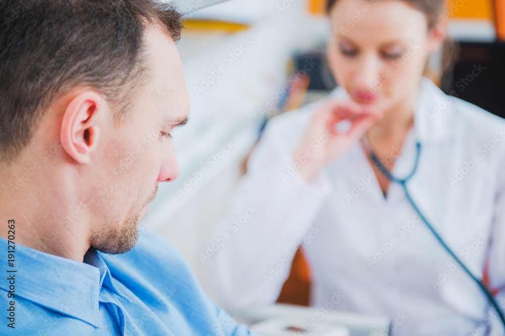 Men Visiting Doctor Office