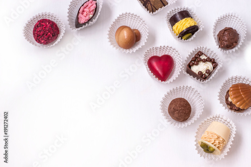 handmade chocolates on white background