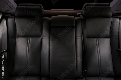 Luxury car interior detail. Leather seats. © alexdemeshko