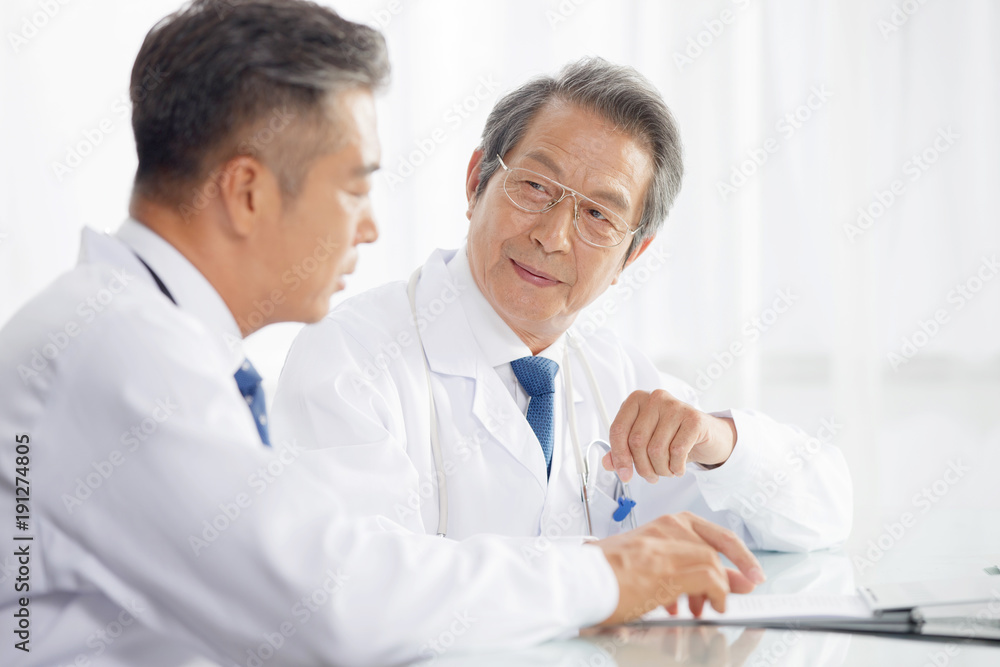 Doctors during meeting in a hospital Doctors during meeting in a hospital