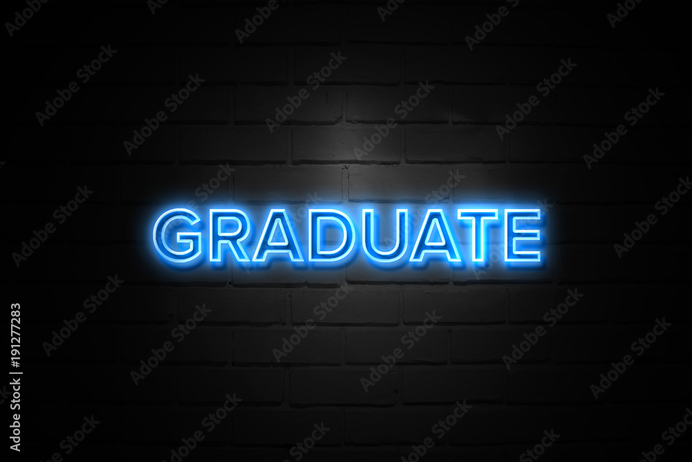 Graduate neon Sign on brickwall Graduate neon Sign on brickwall