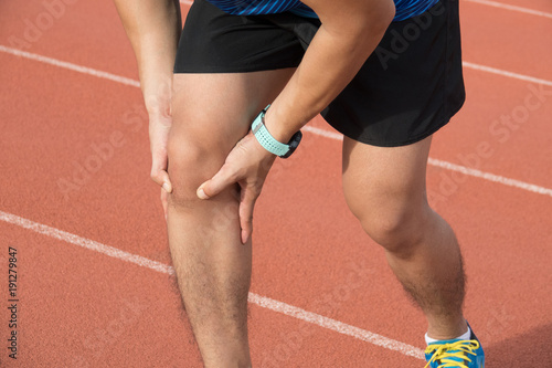 Man having knee pain while exercise, Sport injury concept