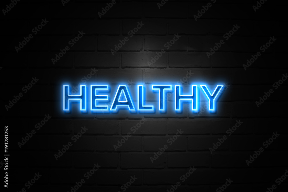 Fototapeta premium Healthy neon Sign on brickwall