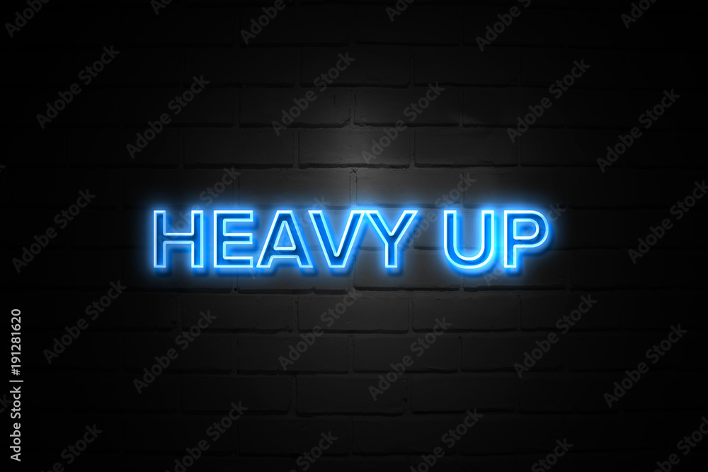 Heavy Up neon Sign on brickwall Heavy Up neon Sign on brickwall