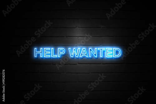 Help Wanted neon Sign on brickwall