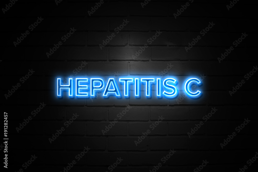 Hepatitis C neon Sign on brickwall Hepatitis C neon Sign on brickwall