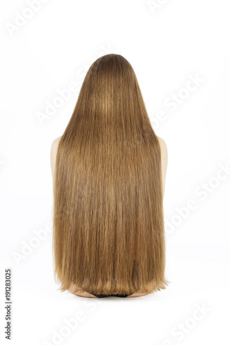 fashion studio photo of beautiful young woman with luxurious long hair, natural color