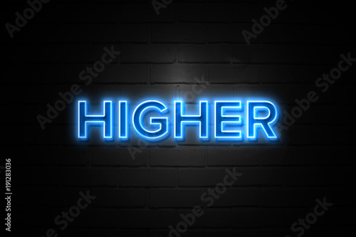 Higher neon Sign on brickwall