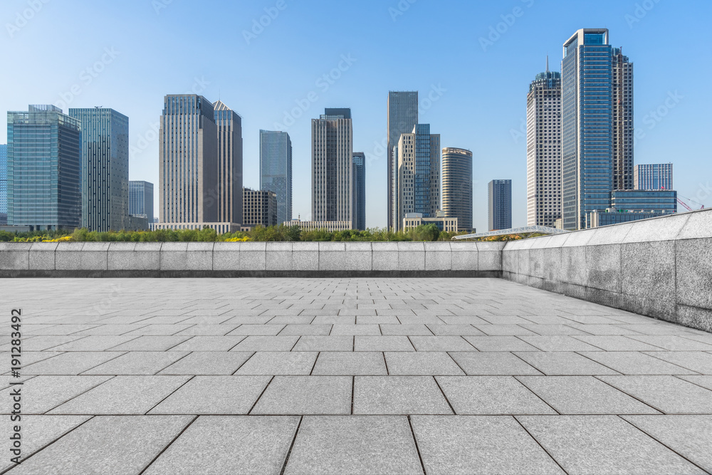 empty brick floor with cityscape and skyline. empty brick floor with cityscape and skyline.