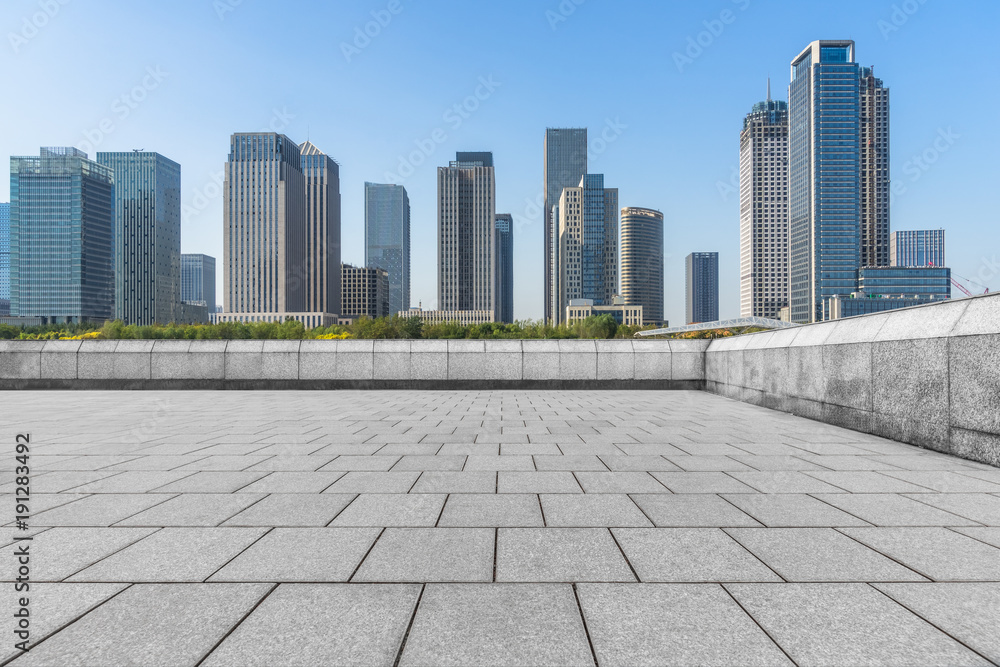 empty brick floor with cityscape and skyline.