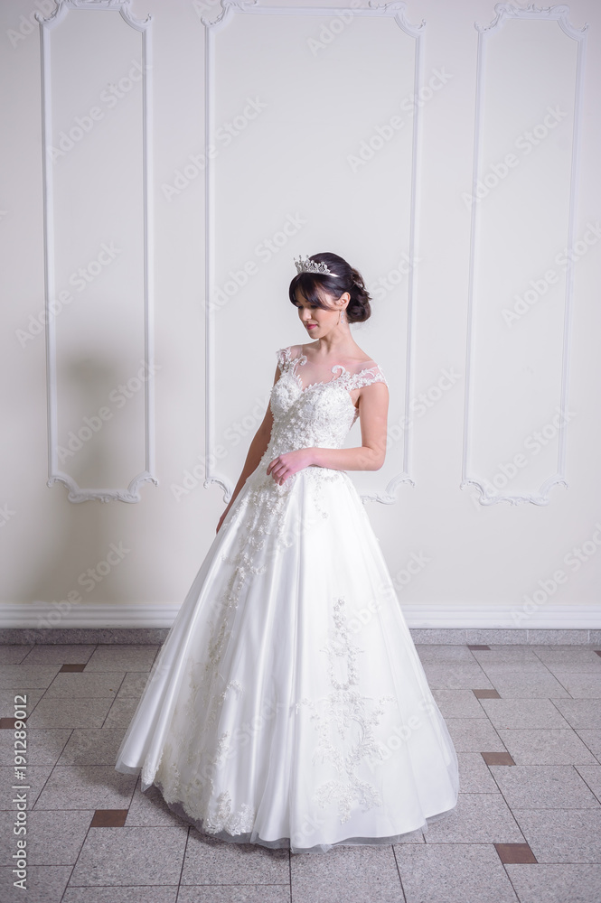 Fototapeta premium Beautiful bride in wedding dress