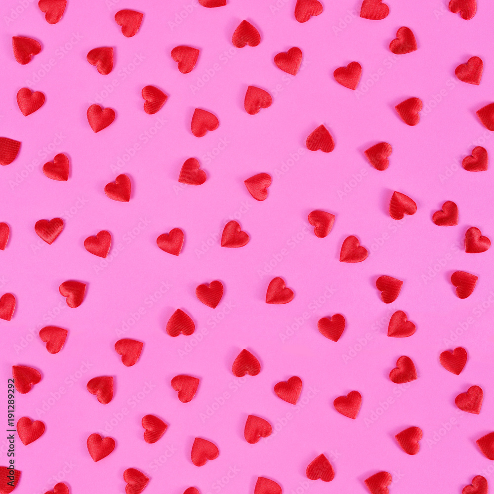 Red hearts on pink background.