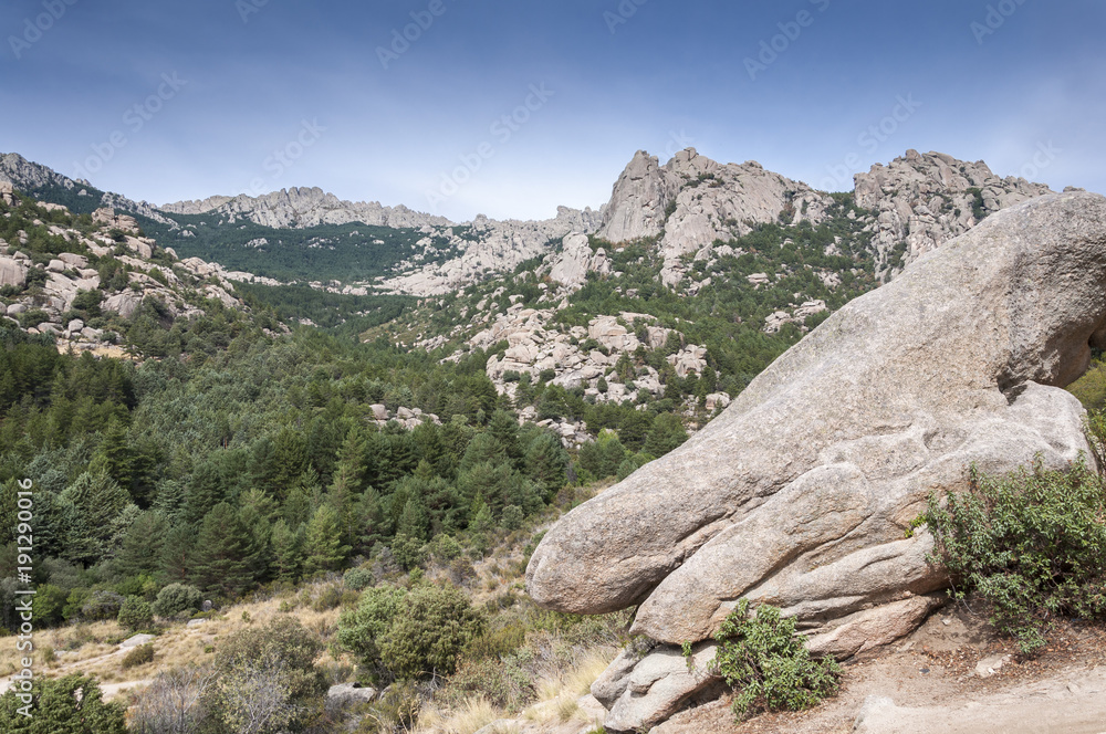 Views of La Pedriza from the Giner de los Rios refuge, in Guadarrama Mountains, Madrid, Spain. It can be seen Las Torres (The Towers), Las Buitreras (Vulture) and El Pajaro (The Bird) peaks