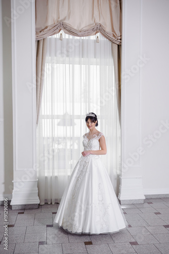 Beautiful bride in wedding dress © alipko