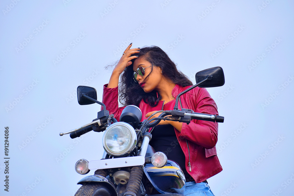 Woman model is posing beside old motorcycles 16234511 Stock Photo at  Vecteezy