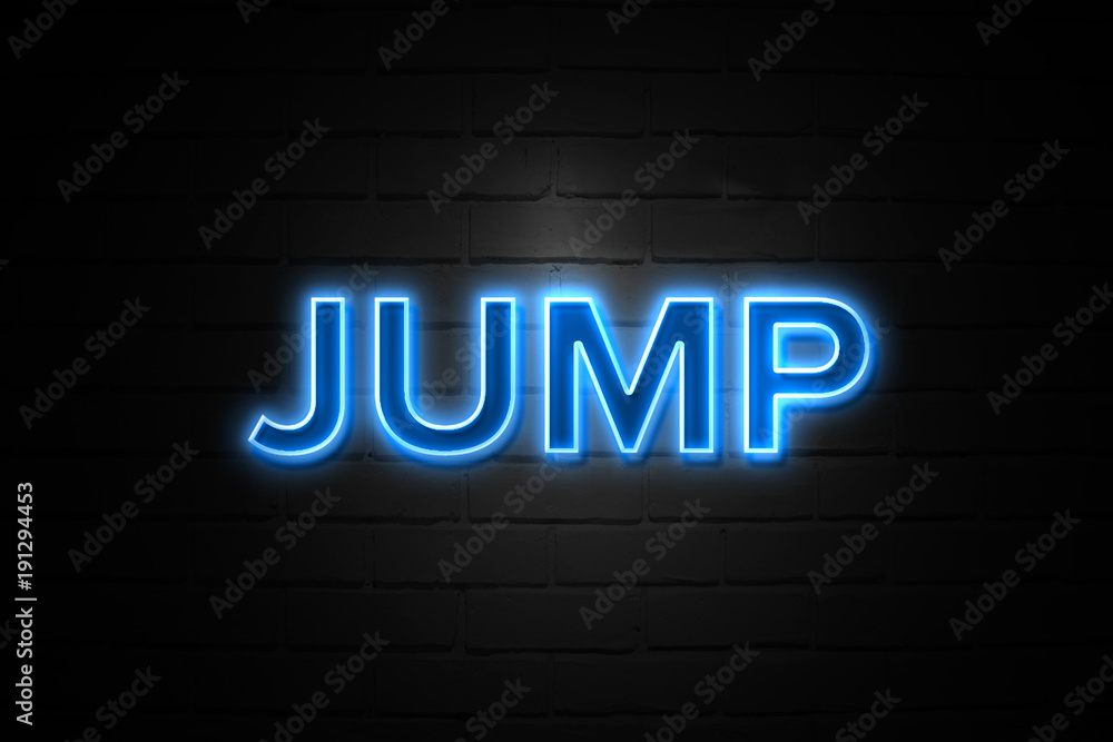 Jump neon Sign on brickwall
