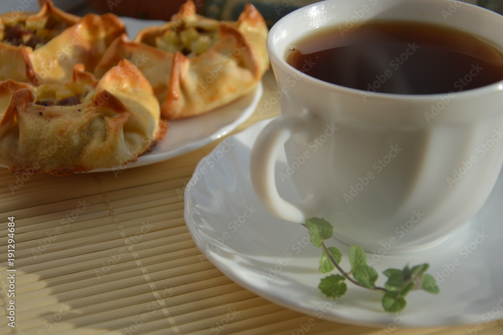 drink black tea with mint and pies with potatoes and meat for Breakfast lunch drink black tea with mint and pies with potatoes and meat for Breakfast lunch