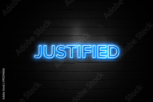 Tableau sur toile Justified neon Sign on brickwall