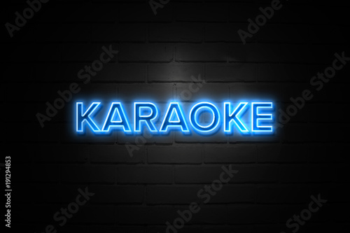 Karaoke neon Sign on brickwall