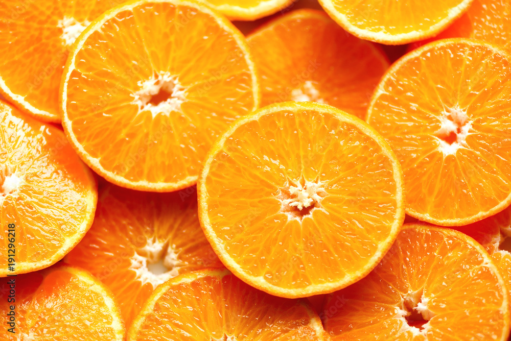 Fresh sliced orange fruit texture. Macro, top view, copy space. Food frame. Juicy oranges background Fresh sliced orange fruit texture. Macro, top view, copy space. Food frame. Juicy oranges background