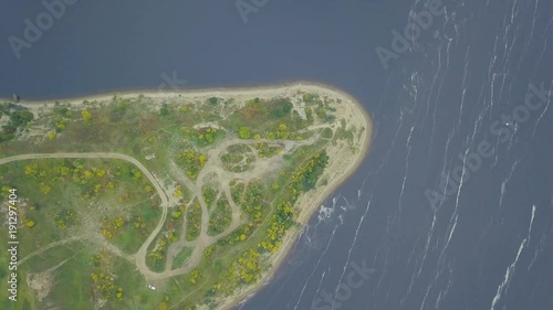Top view of the Cape on the lake. Clip. Stunning lake and foreland view from mount photo