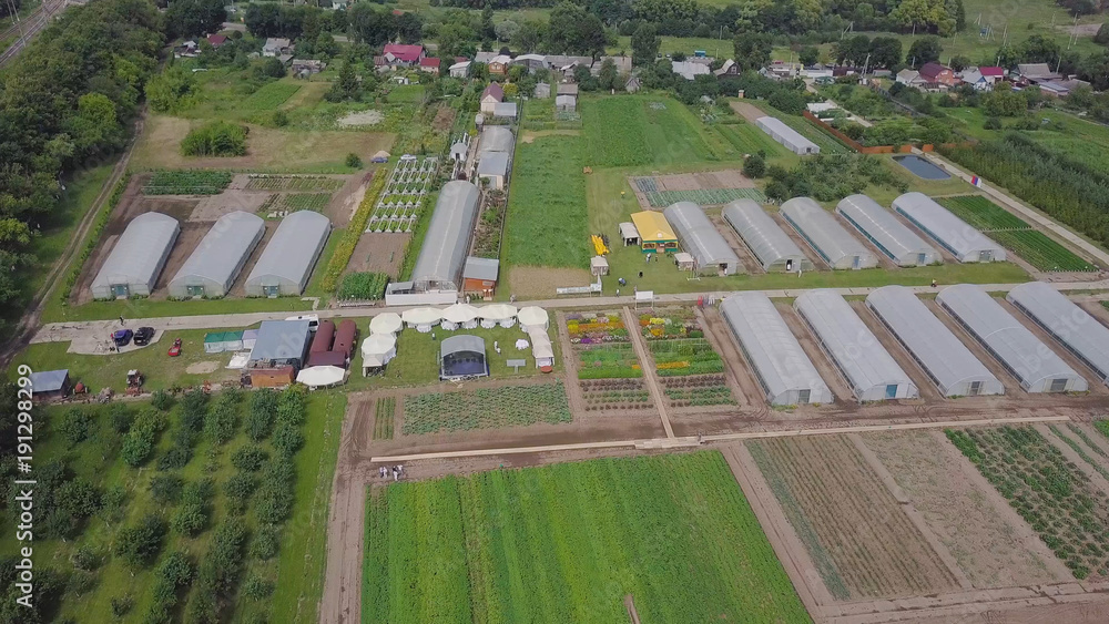 Frameworks of greenhouses, top view. Clip. Construction of greenhouses in the field. Agriculture, agrotechnics of closed ground