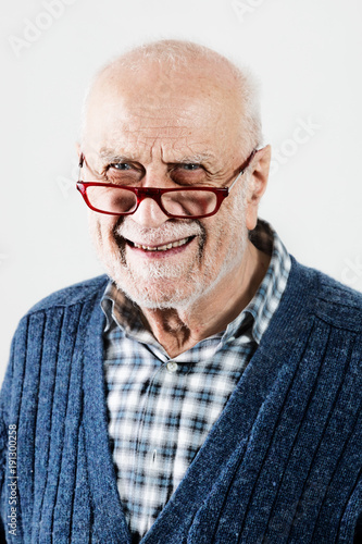 Portrait of senior man on a white background