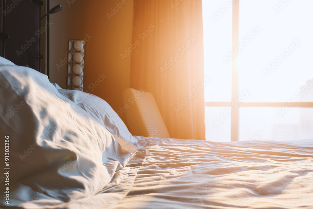 © memorystockphoto - morning sunshine in the bedroom with soft-focus and over light in the background