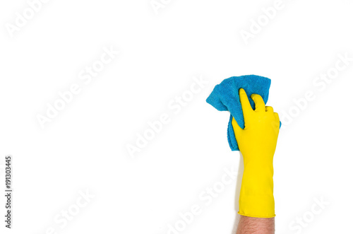 Man's or woman's isolated hand cleaning on a white background. Concept image with copy space for text or design elements. Image taken from above, top view