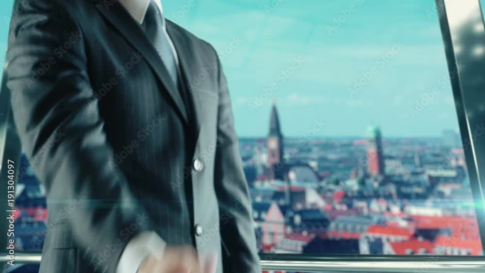 Businessman handshaking at important meeting in Copenhagen Denmark Businessman handshaking at important meeting in Copenhagen Denmark