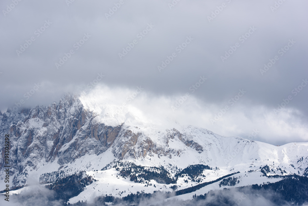 Dolomites. Winter views in the fog and low clouds Dolomites. Winter views in the fog and low clouds