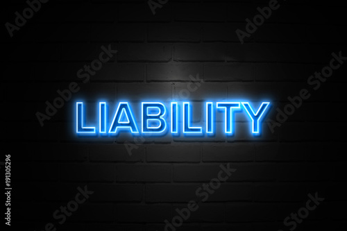 Liability neon Sign on brickwall