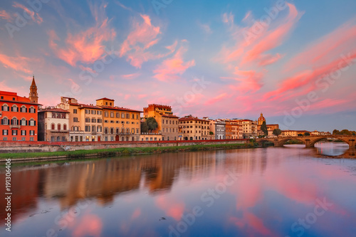 River Arno and famous bridge Ponte Vecchio at gorgeous sunrise in Florence, Tuscany, Italy