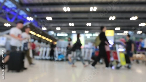 Wallpaper Mural Abstract blur view of commuter crowd of people and passenger walk in the airport terminal, Blurred busy Airport Terminal footage concept. Torontodigital.ca