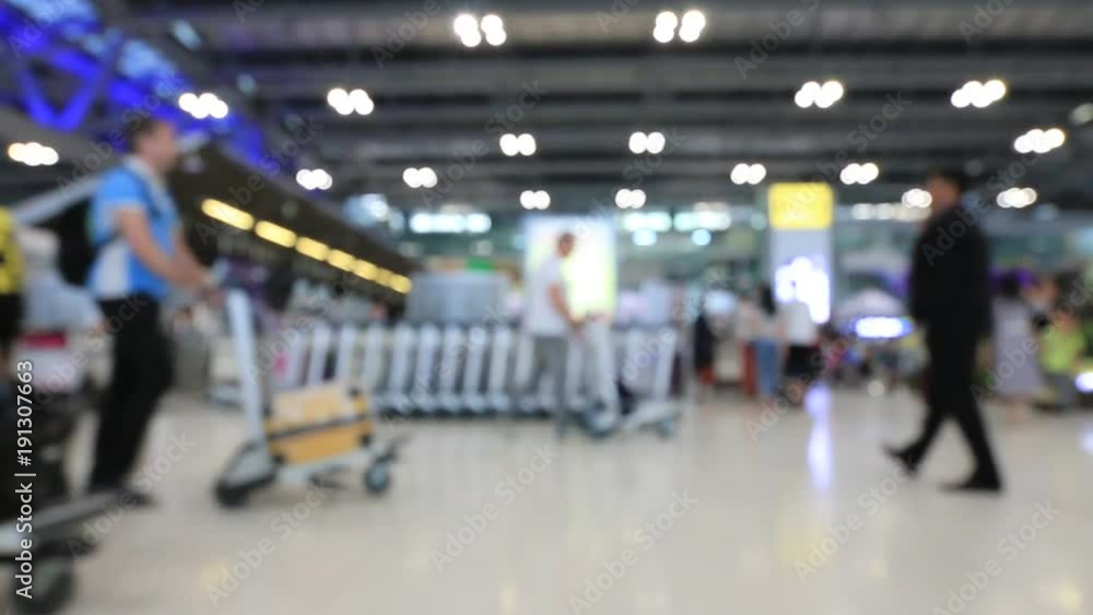 Abstract blur view of commuter crowd of people and passenger walk in the airport terminal, Blurred busy Airport Terminal footage concept. Abstract blur view of commuter crowd of people and passenger walk in the airport terminal, Blurred busy Airport Terminal footage concept.