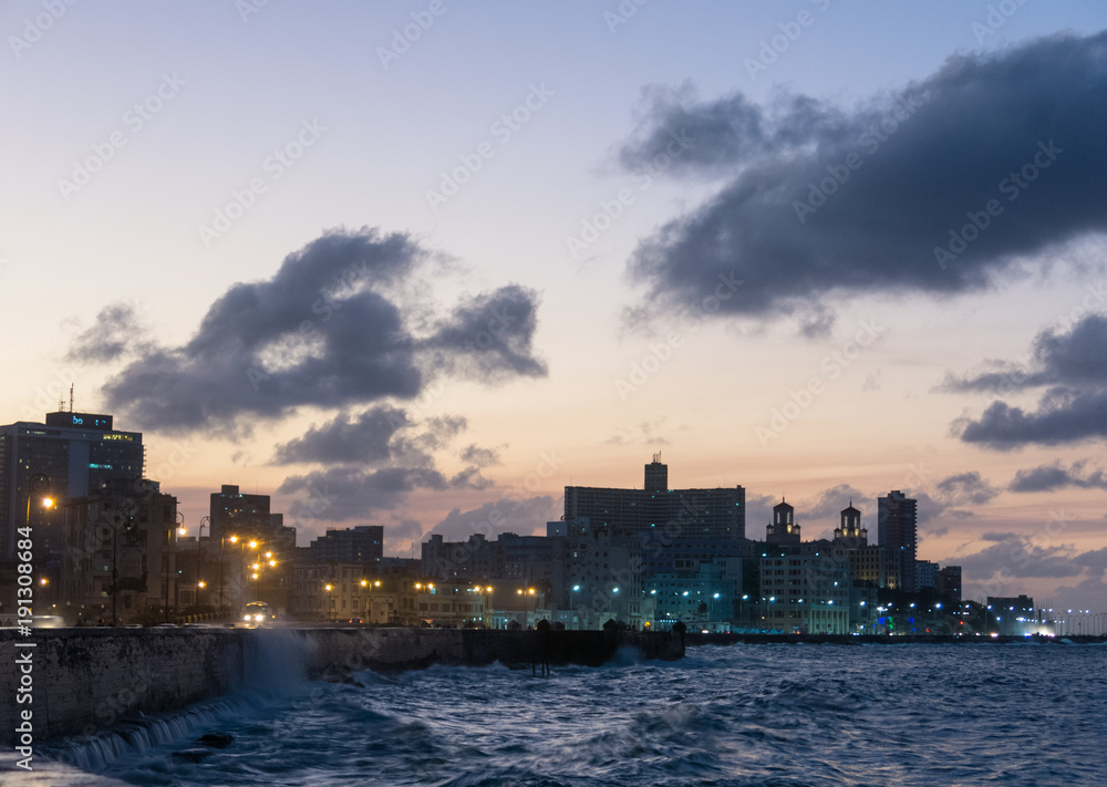 Sunset in the famous malecon in Havana, Cuba